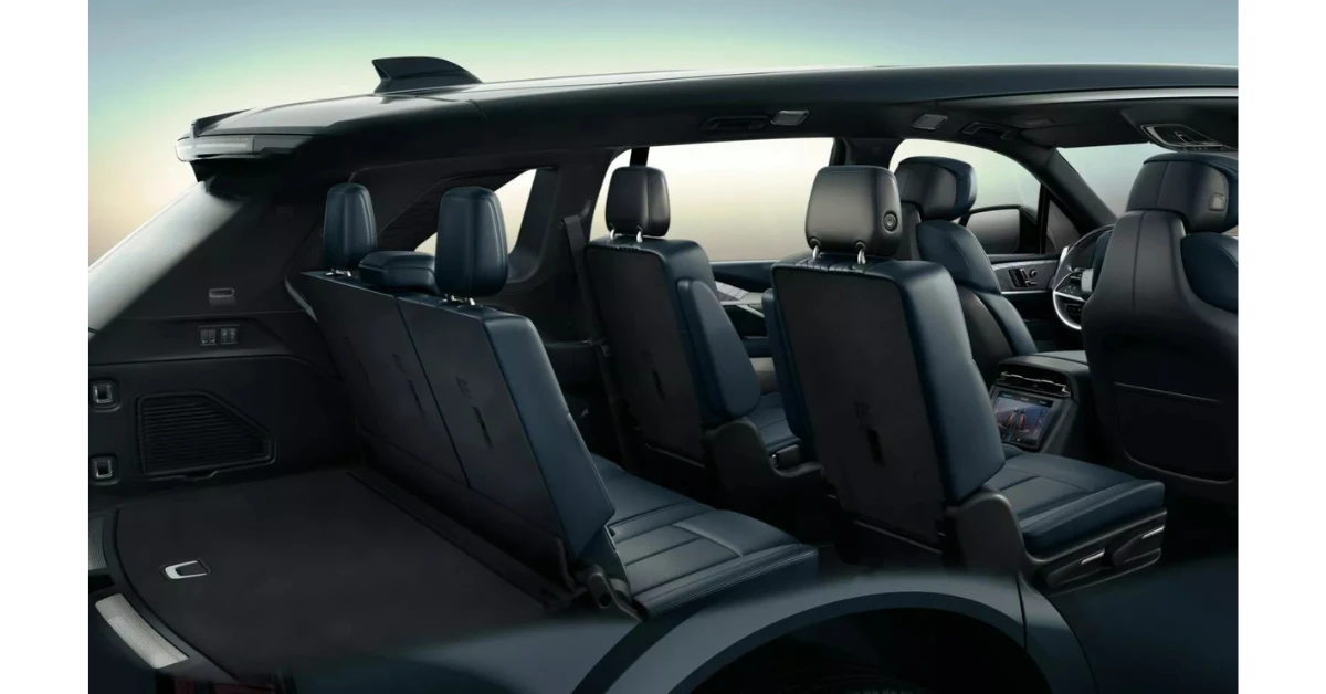 The three-row interior of the 2026 Escalade IQL offers expansive space for up to seven passengers. The extended body provides an additional 4.4 inches of third-row legroom and an extra inch of headroom compared to the standard IQ model, enhancing comfort for all occupants.