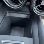 The 2025 Blazer EV offers practical interior storage solutions with a spacious center console compartment featuring USB ports for device connectivity.