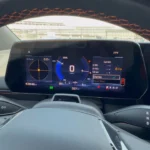 Digital instrument cluster of the 2025 Chevrolet Blazer EV showing speed, battery level, range information, and G-force meter.