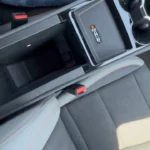 The 2025 Blazer EV RS features a multifunctional center console with integrated armrest, storage compartment, and an RS-branded removable storage tray.