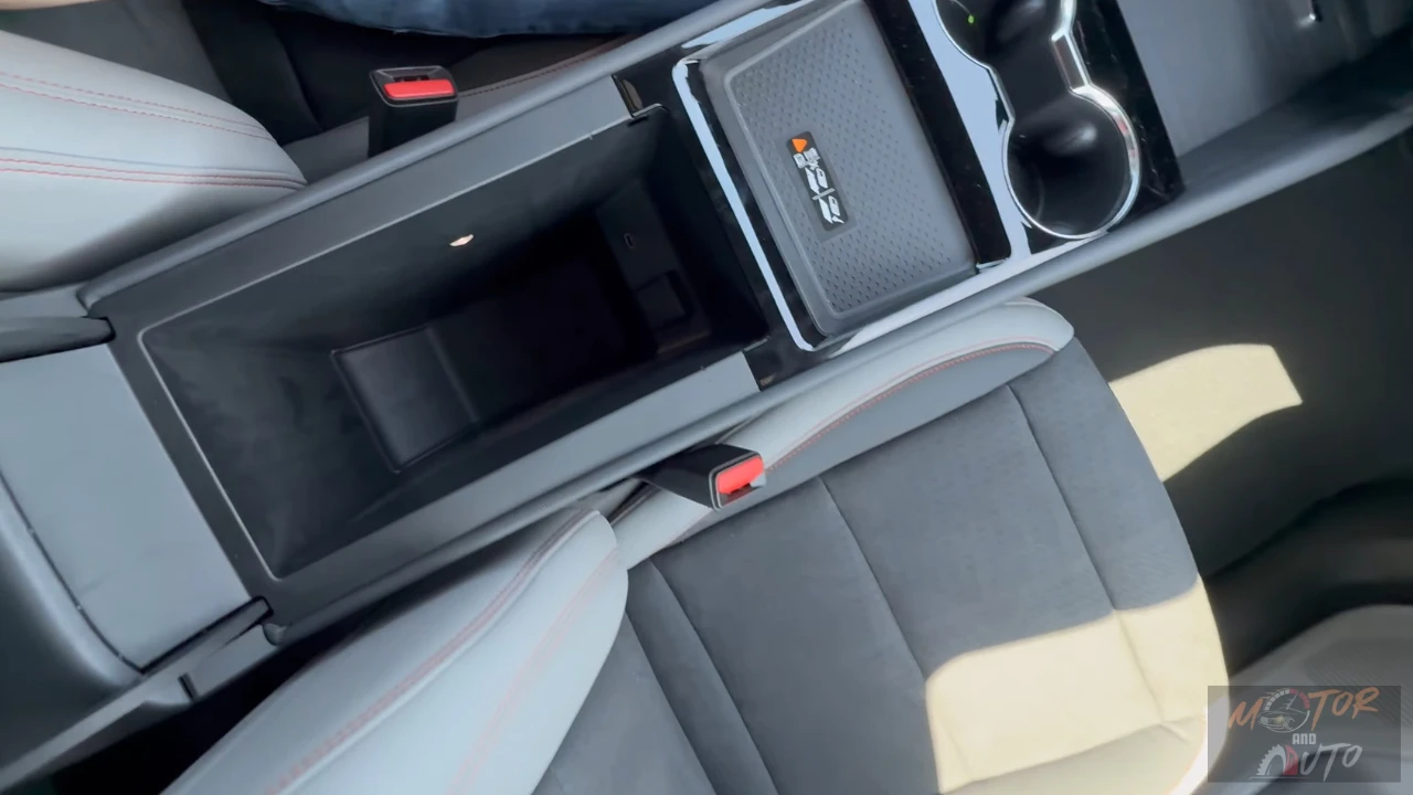 The 2025 Blazer EV RS features a multifunctional center console with integrated armrest, storage compartment, and an RS-branded removable storage tray.