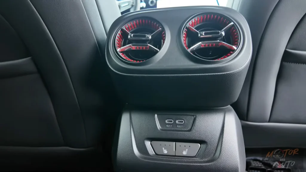 Rear passengers in the 2025 Blazer EV enjoy dedicated air vents with red accent lighting, plus USB-C ports and available heated seat controls for second-row comfort.