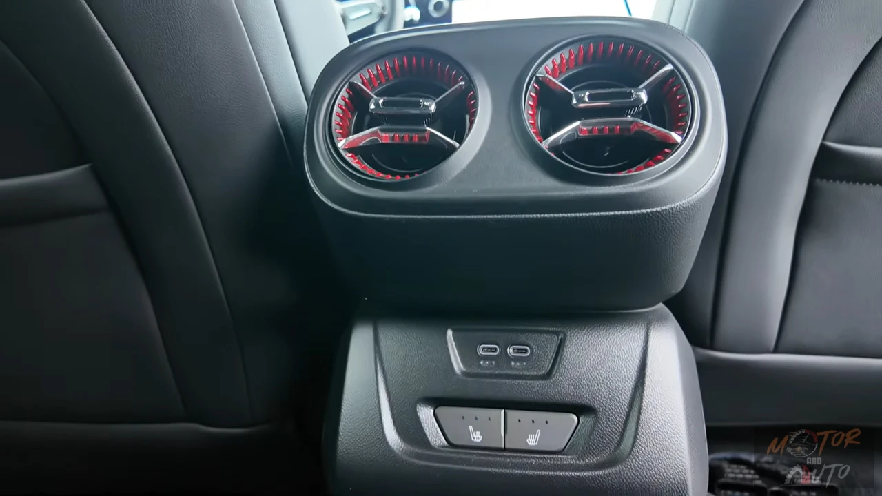 Rear passengers in the 2025 Blazer EV enjoy dedicated air vents with red accent lighting, plus USB-C ports and available heated seat controls for second-row comfort.