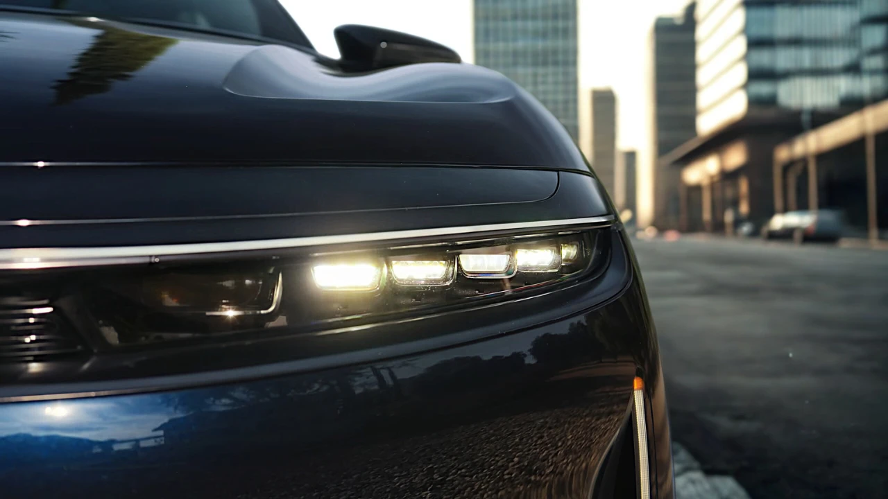 Close-up detail of the 2025 Lucid Air's advanced headlight system featuring Intelligent Micro Lens Array technology.