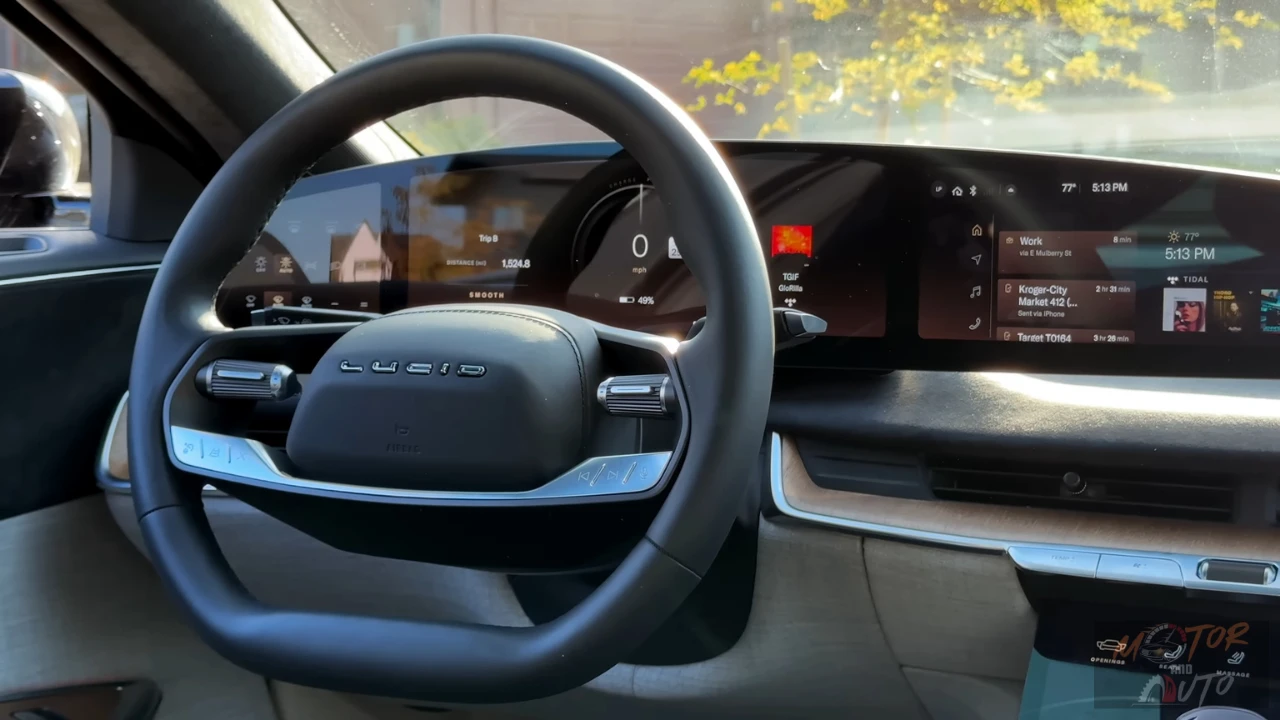 Close-up view of the 2025 Lucid Air's digital instrument cluster showing speedometer, drive mode indicator, and navigation information on the curved display with the steering wheel visible in the foreground.