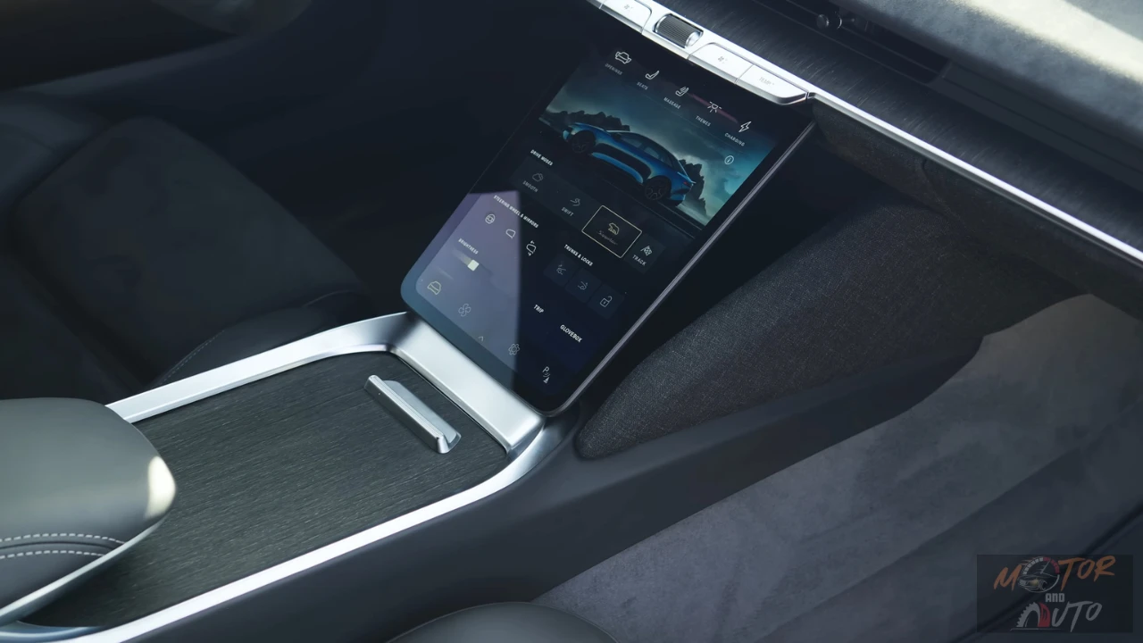 The 2025 Lucid Air's innovative lower touchscreen display featuring the vehicle settings menu and drive mode controls. This screen can retract into the dashboard to reveal additional storage space, demonstrating Lucid's thoughtful interior design approach.