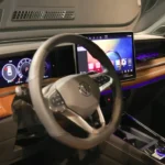 The sophisticated ambient lighting system offers up to 30 customizable colors on the top trim, integrating into door panels, dashboard trim, and creating premium evening atmosphere throughout the cabin.