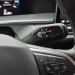 Gear selector on steering column of 2025 Volkswagen Tiguan showing PRND positions and modern shift-by-wire design