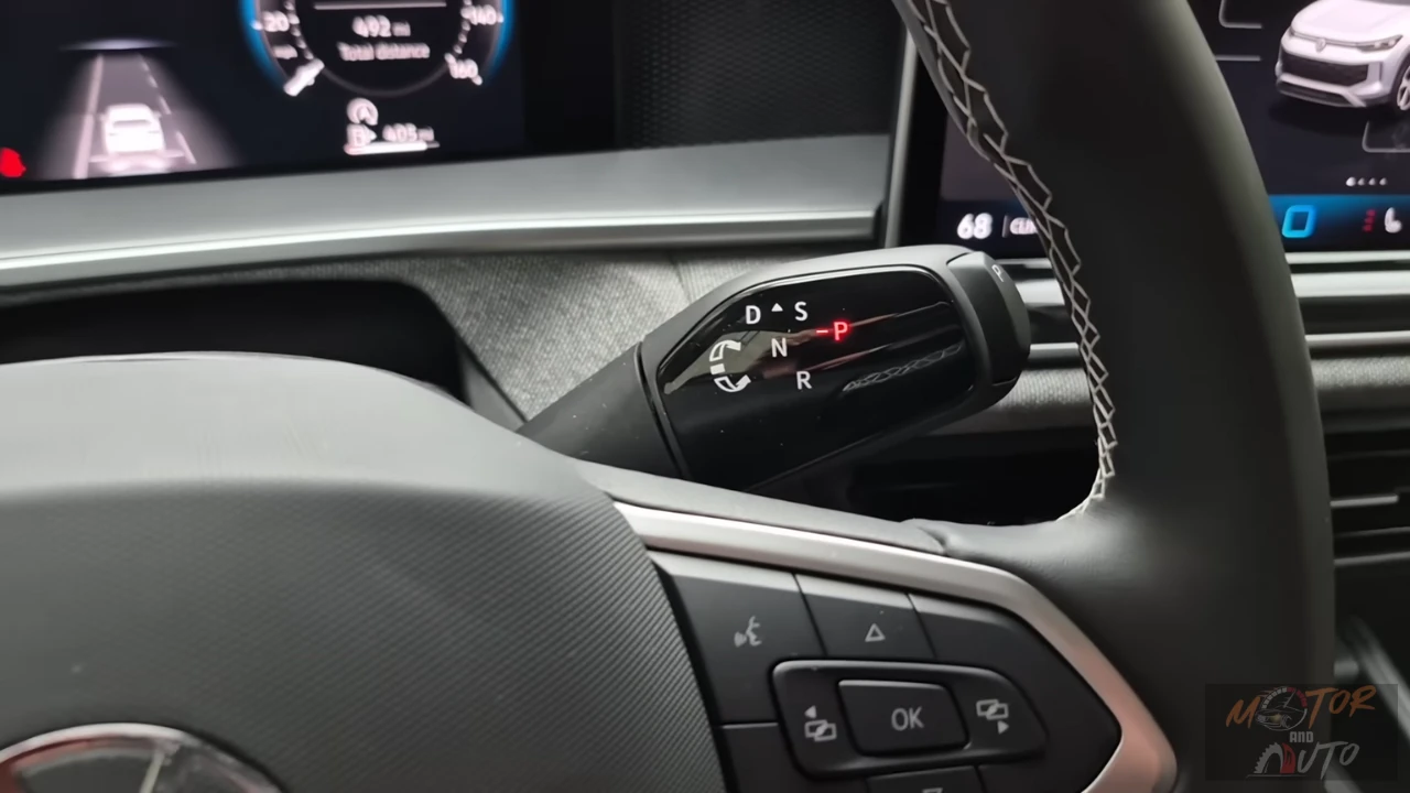Gear selector on steering column of 2025 Volkswagen Tiguan showing PRND positions and modern shift-by-wire design