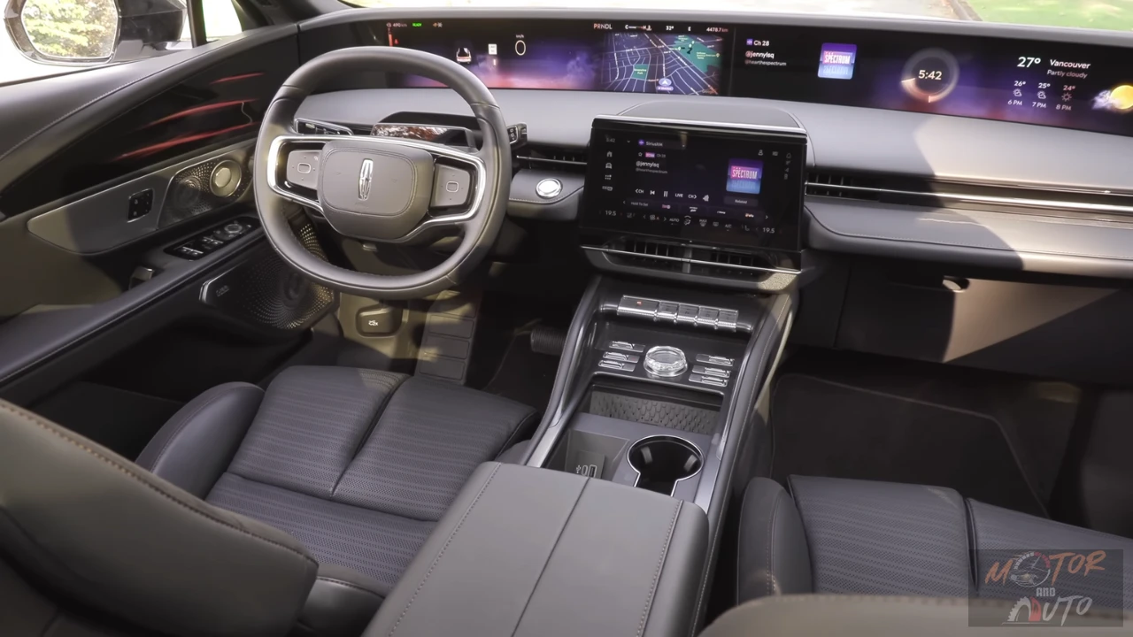 Complete dashboard view of 2025 Lincoln Nautilus showing the full 48-inch curved display spanning the width of the cabin, steering wheel, and luxury interior appointments