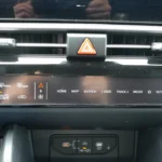 Media control interface of 2026 Kia Sportage infotainment system showing home, map, search, seek, track, media, and setup buttons with dual-function control panel