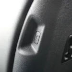 Close-up view of USB-C charging port integrated into front seatback of 2026 Kia Sportage for rear passenger device charging convenience