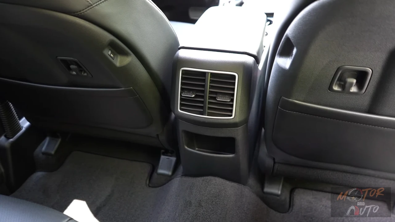 Rear seat area of 2026 Kia Sportage showing air vents, storage compartments, and passenger comfort features for second-row occupants